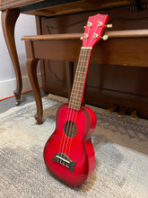 Load image into Gallery viewer, New! Makala Red Burst Soprano Dolphin Ukulele
